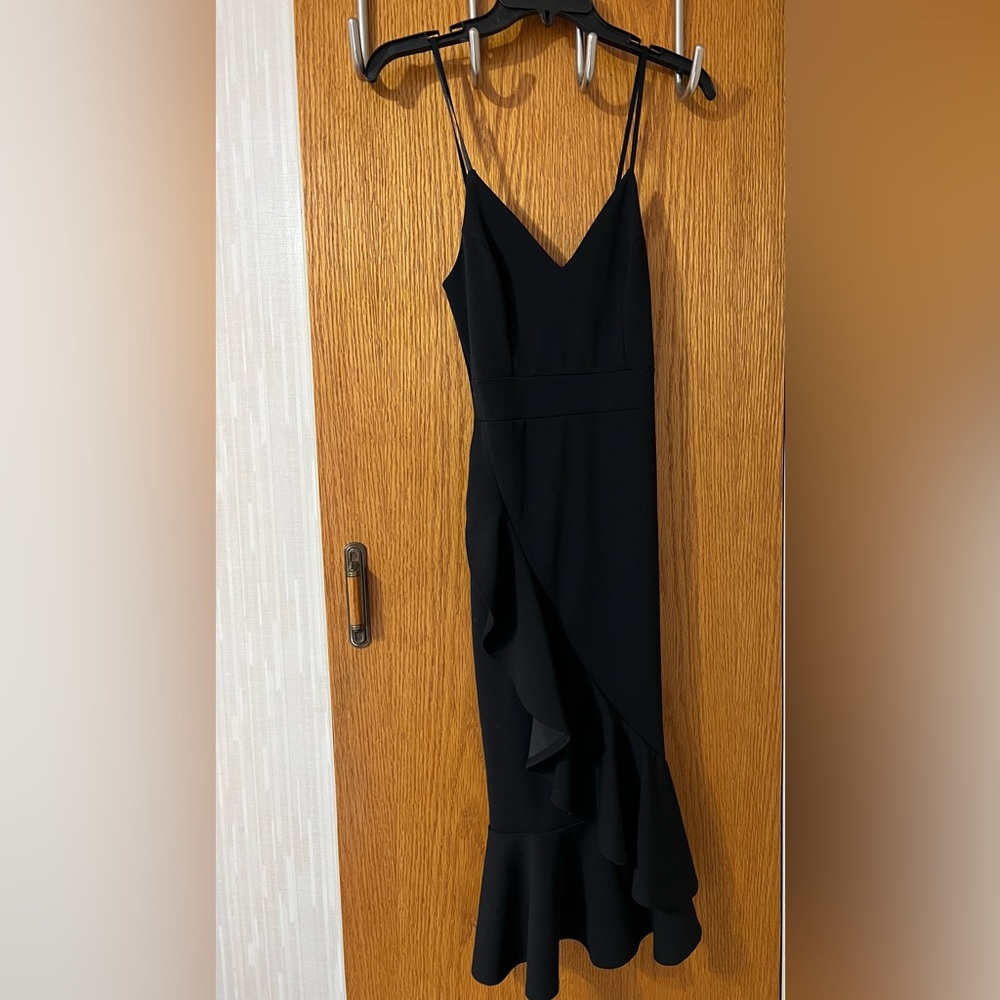 Black Short ruffle spaghetti strap dress. Size xsmall